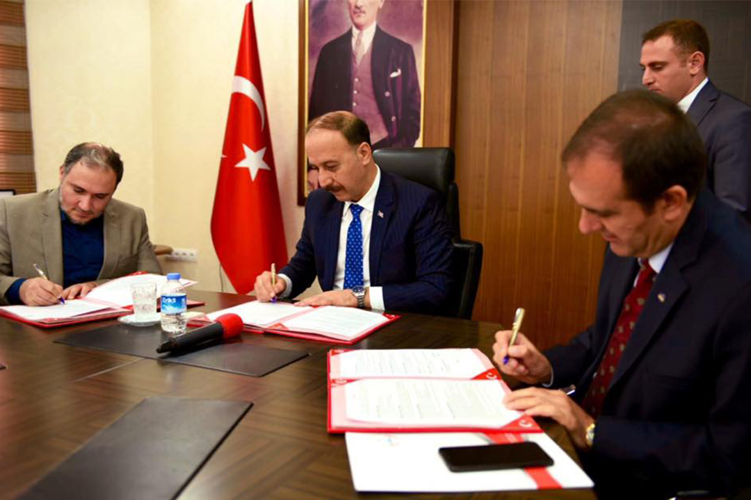 Signing a Protocol to Establish a Secondary School with the Mayor of Urfa Mr. Abdullah Arin